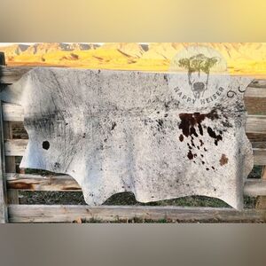 Stunning Brazilian Gray, Black and Brown Splatter Cowhide Rug